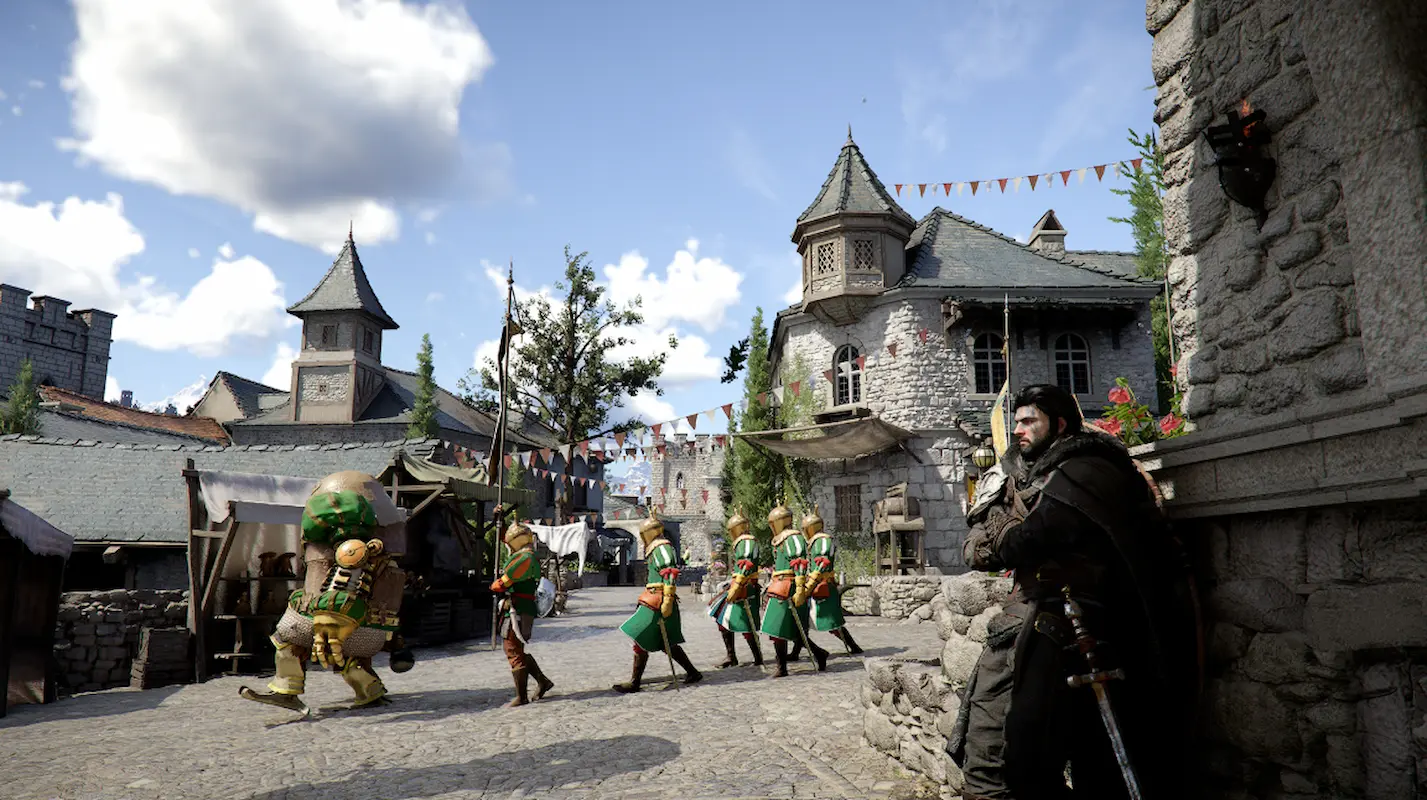 A bright, daylight scene in a medieval-style town from the game Crimson Desert. In the foreground, the dark-haired protagonist leans against a stone wall, looking toward a cobblestone street.