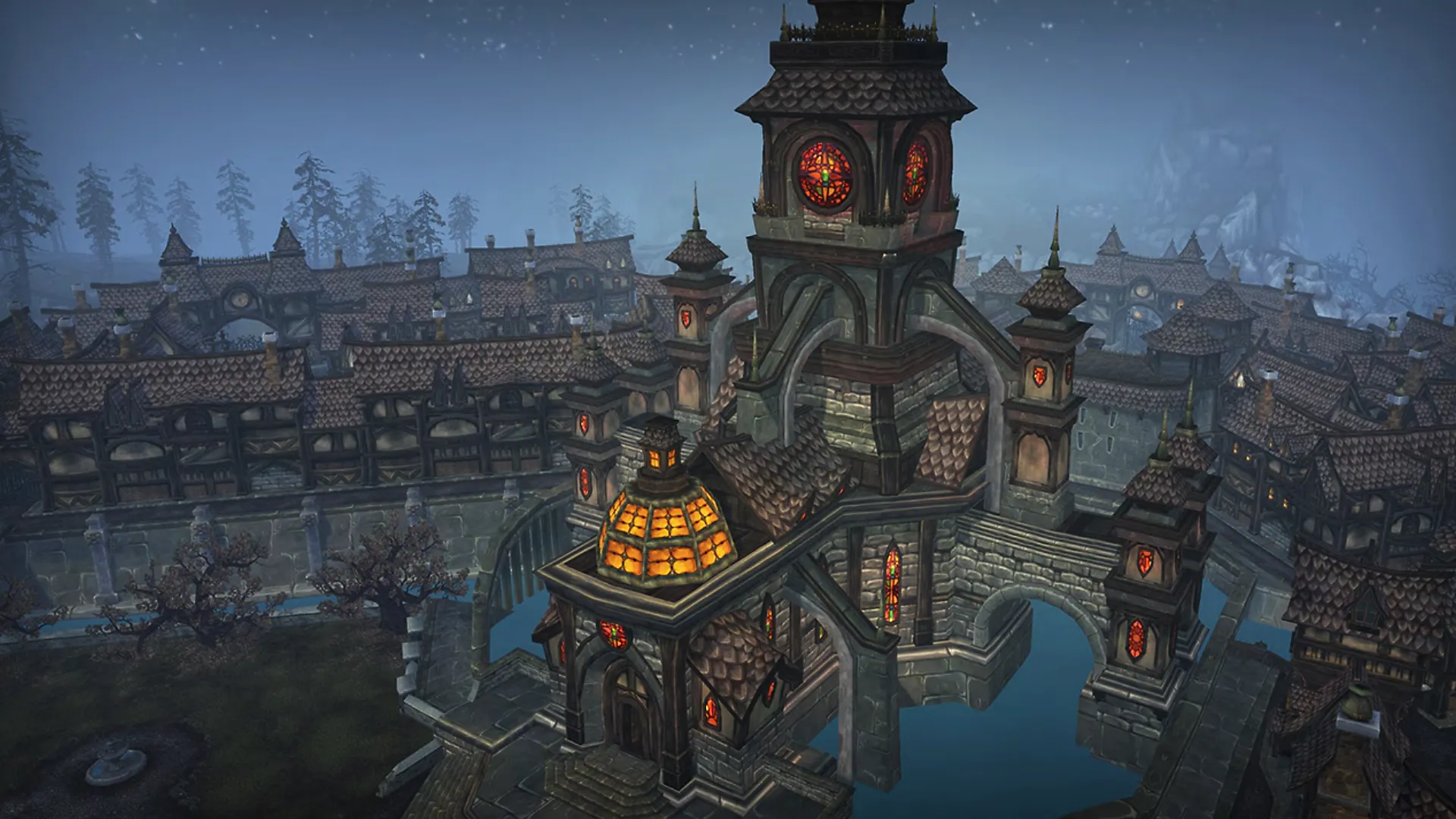 A wide shot of Gilneas City from World of Warcraft, showing the iconic Light Dawn Cathedral at night. The city features Victorian-Gothic architecture with steep, brown-tiled roofs and dark stone walls. Glowing orange stained-glass windows illuminate the cathedral tower and the surrounding houses. The atmosphere is foggy and somber, with the dark silhouettes of the Blackwald trees and mountains visible in the distance under a starry sky.