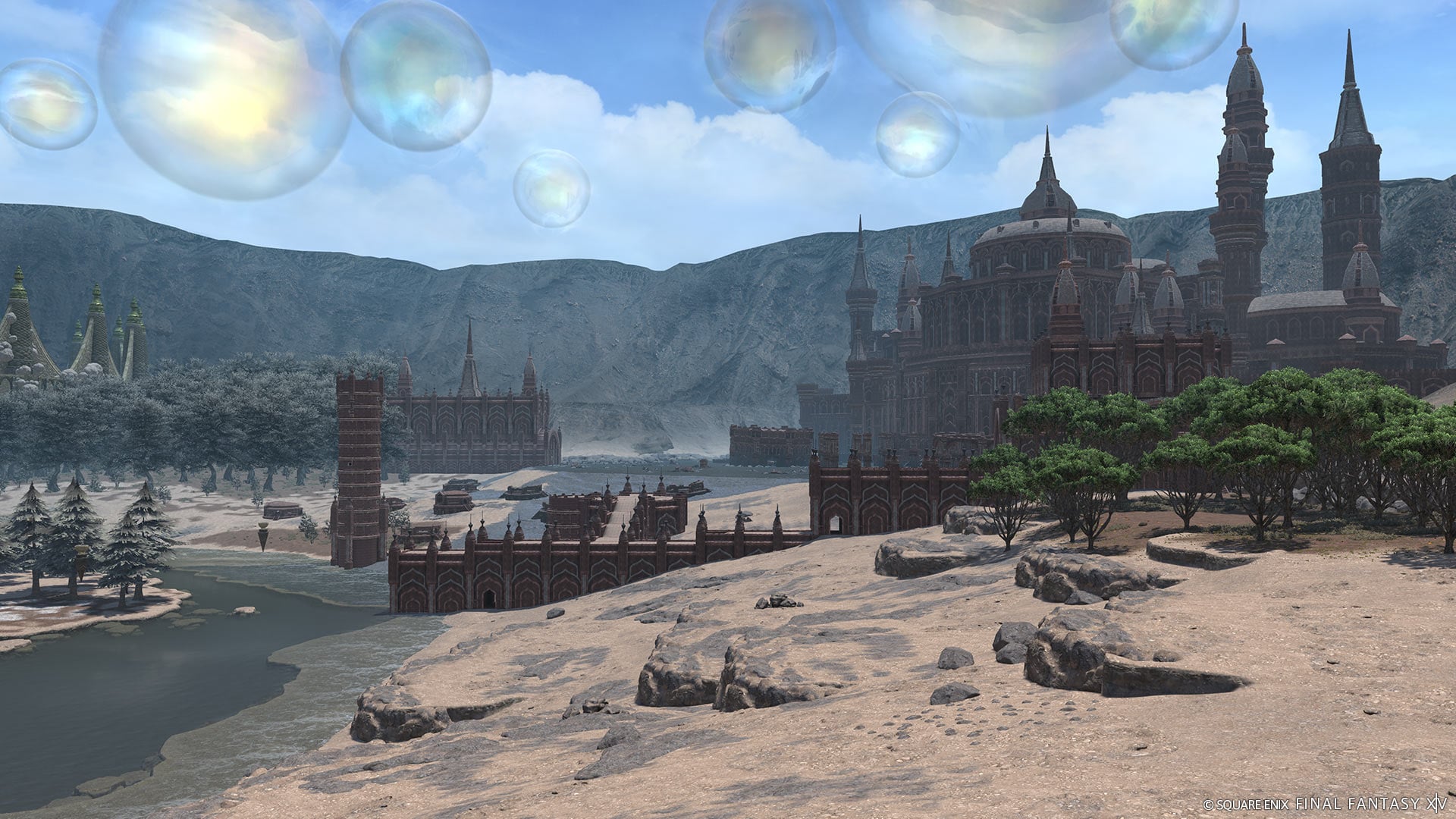 A view of North Horn with buildings in the background surrounded by trees and sand